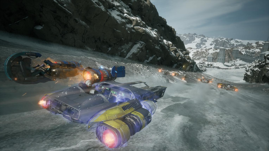 Galactic Racer racing vehicles navigate a challenging alien track surrounded by dramatic planetary scenery.